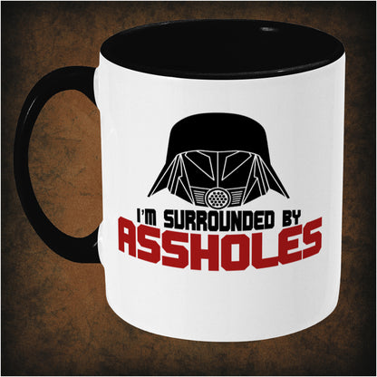 I’m Surrounded by Assholes’ two-toned mug inspired by Spaceballs, left hand side featuring iconic comedy movie quote, bold design, and collectible Mel Brooks film merchandise for sci-fi parody fans.