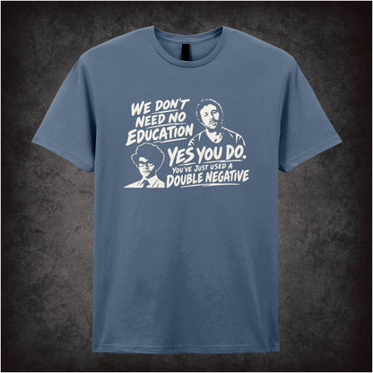 “Roy & Moss ‘We don’t need no education… Yes you do, you’ve just used a double negative’ T-shirt in indigo from The IT Crowd”