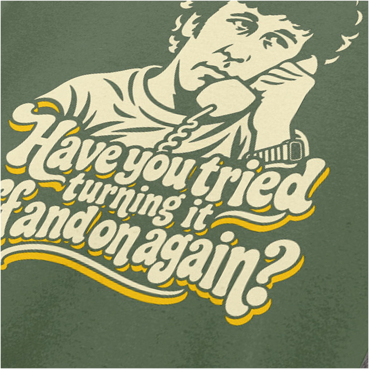  "‘Have you tried turning it off and on again?' close up T-shirt in military green from The IT Crowd”