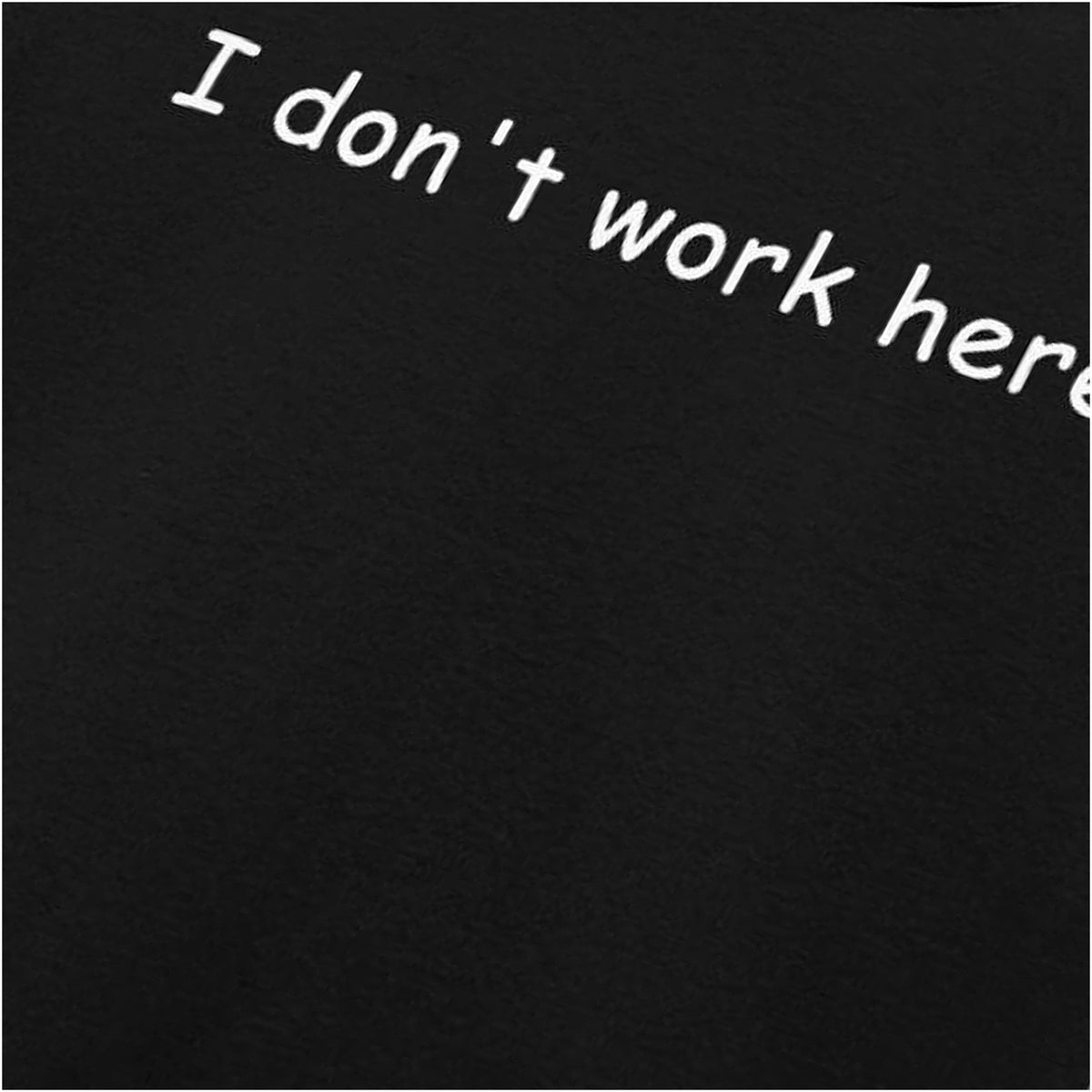 “‘I don’t work here.’ close up T-shirt in black from The IT Crowd”