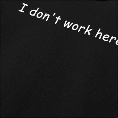 “‘I don’t work here.’ close up T-shirt in black from The IT Crowd”