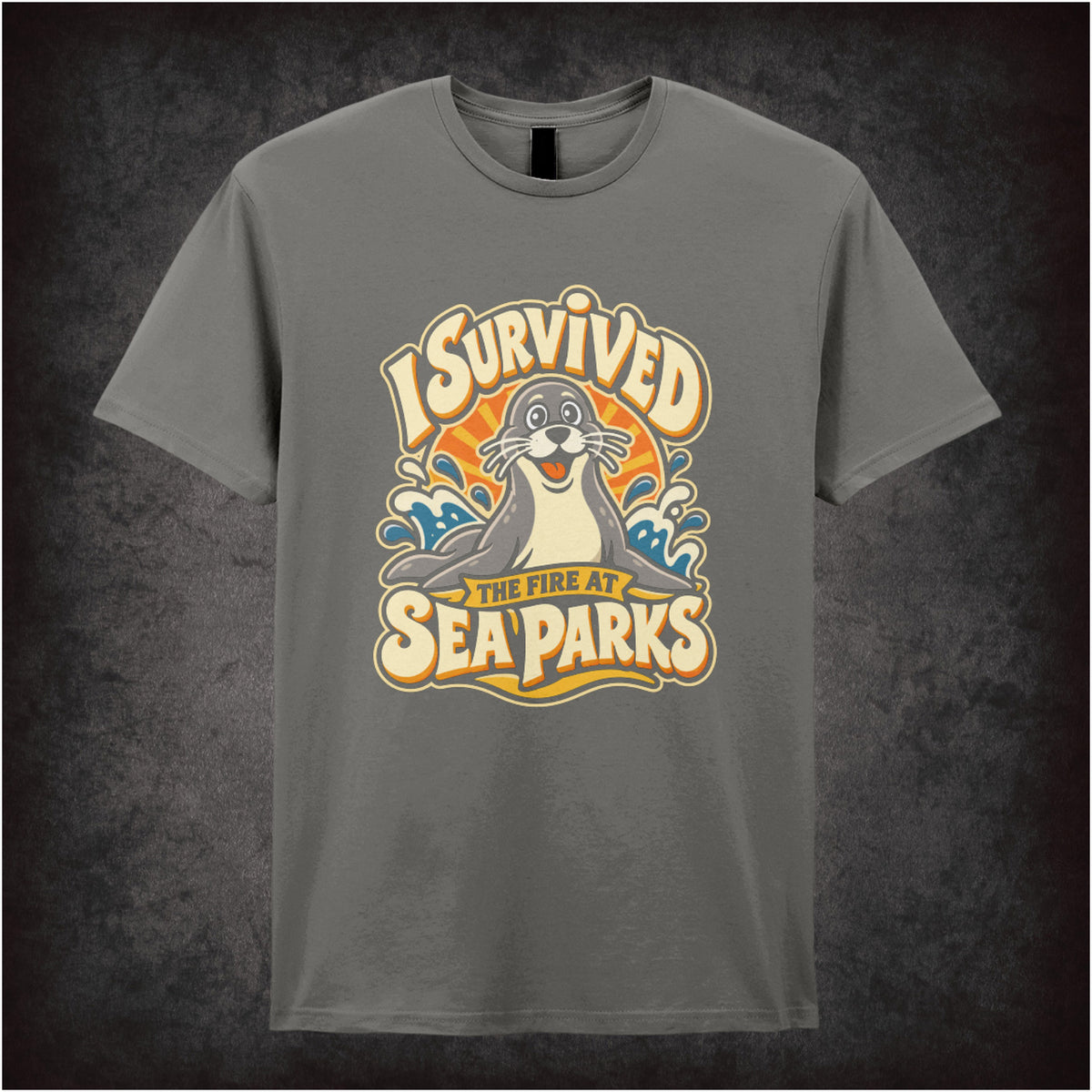 “‘I survived the fire at Sea Parks’ T-shirt in charcoal from The IT Crowd”