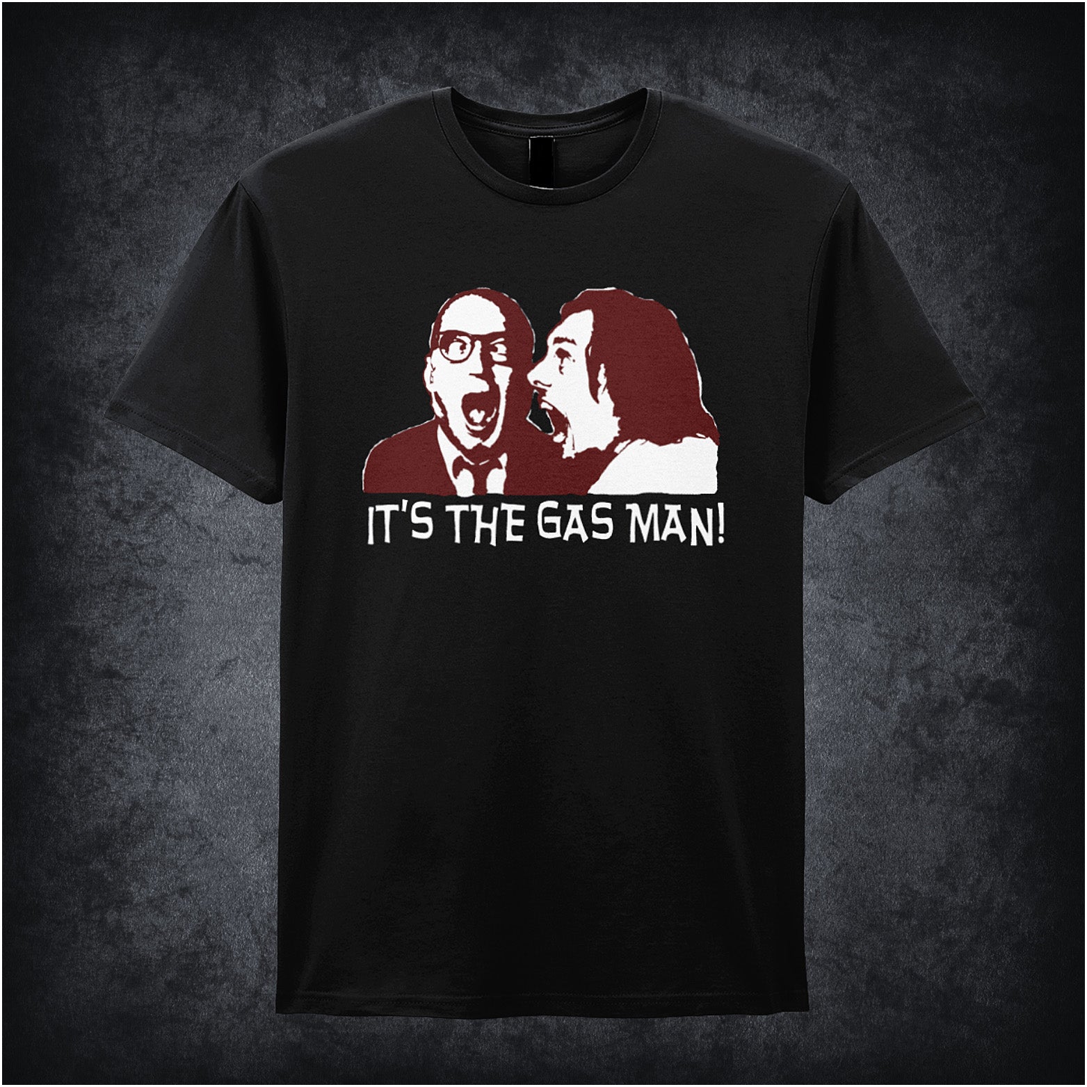 black unisex T-shirt featuring the phrase “It's The Gas Man!” inspired by Bottom, displayed in bold white lettering with a comedic, punchy style.