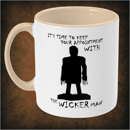 Time to keep your appointment with the Wicker Man’ two-toned mug inspired by The Wicker Man, left hand side featuring classic folk horror quote, vintage design, and collectible movie merchandise.