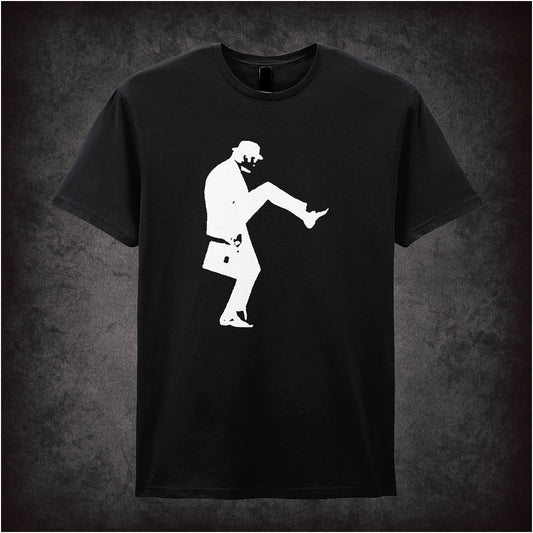 Black unisex t-shirt featuring a silhouette graphic of John Cleese doing his famous Silly Walk, wearing a bowler hat and carrying a briefcase, inspired by Monty Python.