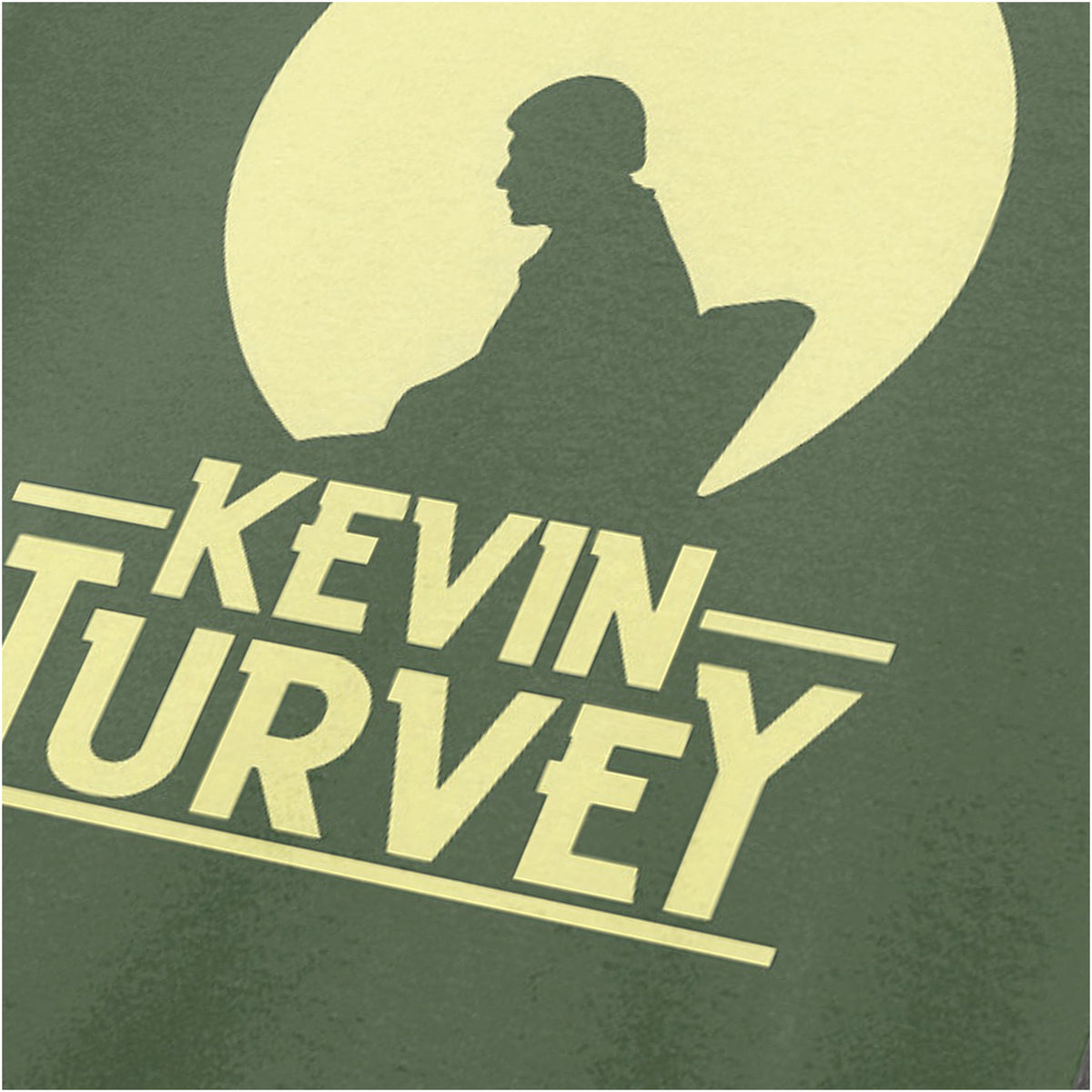 “‘Kevin Turvey silhouette’ close up T-shirt in military green from Kevin Turvey (Rik Mayall)”