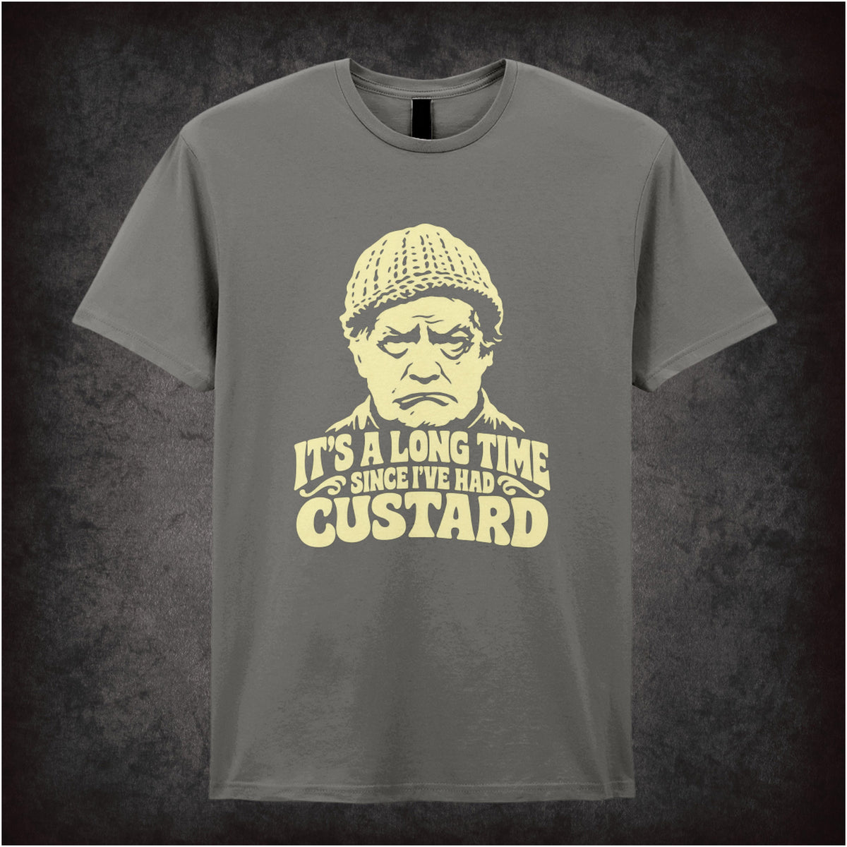 “Compo ‘It’s a long time since I’ve had custard’ T-shirt in charcoal from Last of the Summer Wine”