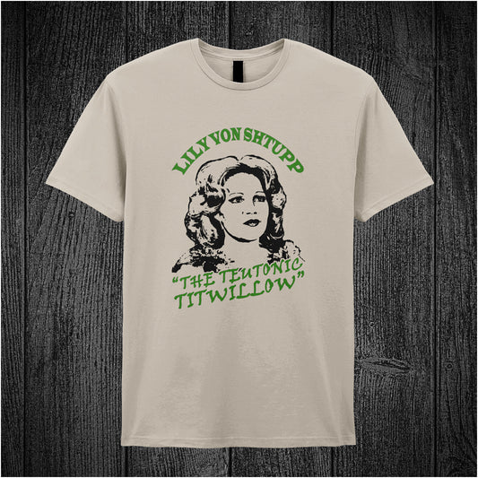 Lily Von Shtupp The Teutonic Titwillow – Blazing Saddles-inspired design featuring stylized text and vintage theatrical elements printed on a sand coloured unisex t-shirt.