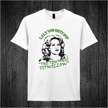 Lily Von Shtupp The Teutonic Titwillow – Blazing Saddles-inspired design featuring stylized text and vintage theatrical elements printed on a white coloured unisex t-shirt.
