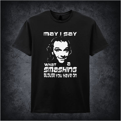 black unisex T-shirt featuring the phrase “May I Say What A Smashing Blouse You Have On” inspired by Bottom, displayed in bold white text with a cheeky retro vibe.