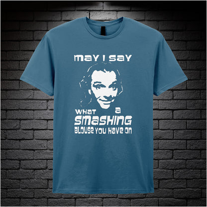 indigo unisex T-shirt featuring the phrase “May I Say What A Smashing Blouse You Have On” inspired by Bottom, displayed in bold white text with a cheeky retro vibe.