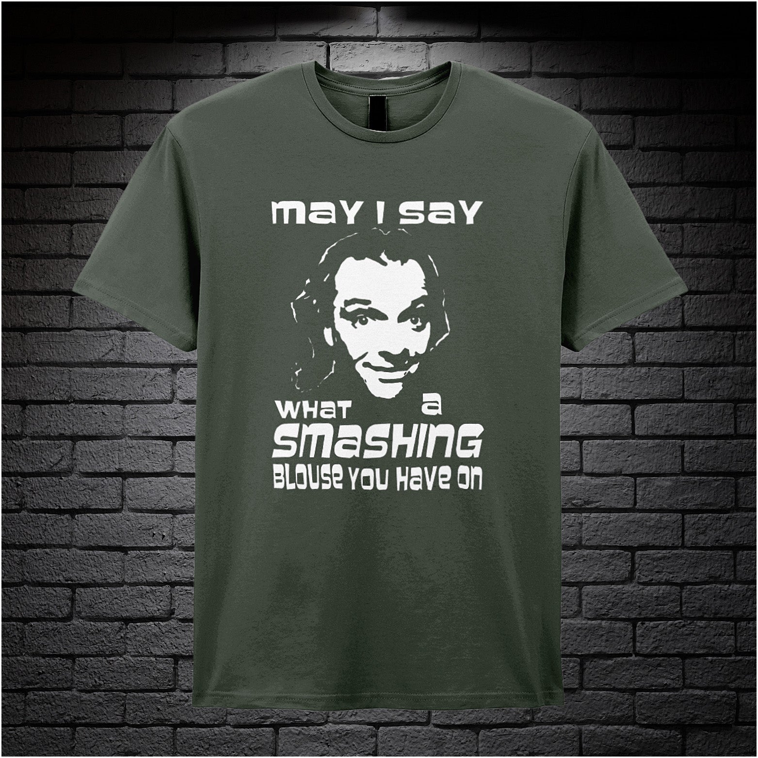 military green unisex T-shirt featuring the phrase “May I Say What A Smashing Blouse You Have On” inspired by Bottom, displayed in bold white text with a cheeky retro vibe.