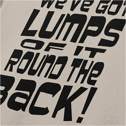 ‘We’ve got lumps of it round the back’ quote T-shirt close up in sand from Monty Python and the Holy Grail