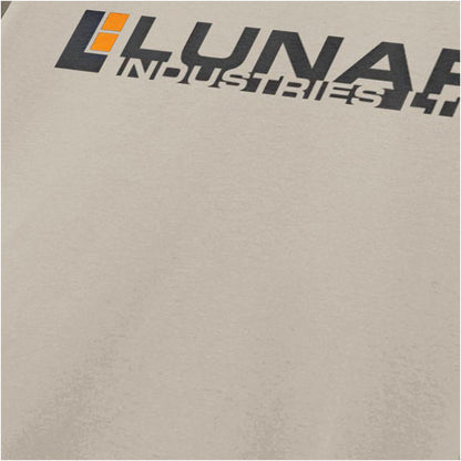 Close-up of lunar Industries logo T-shirt in sand from Moon