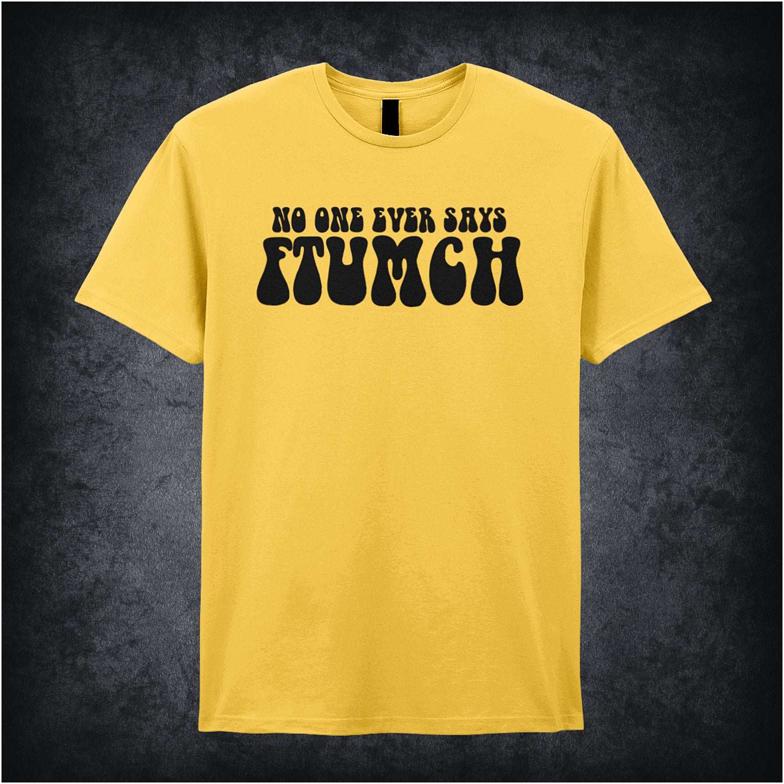 daisy unisex t-shirt featuring the phrase “No One Ever Says Ftumch” inspired by The Young Ones TV show, with playful, bold lettering.