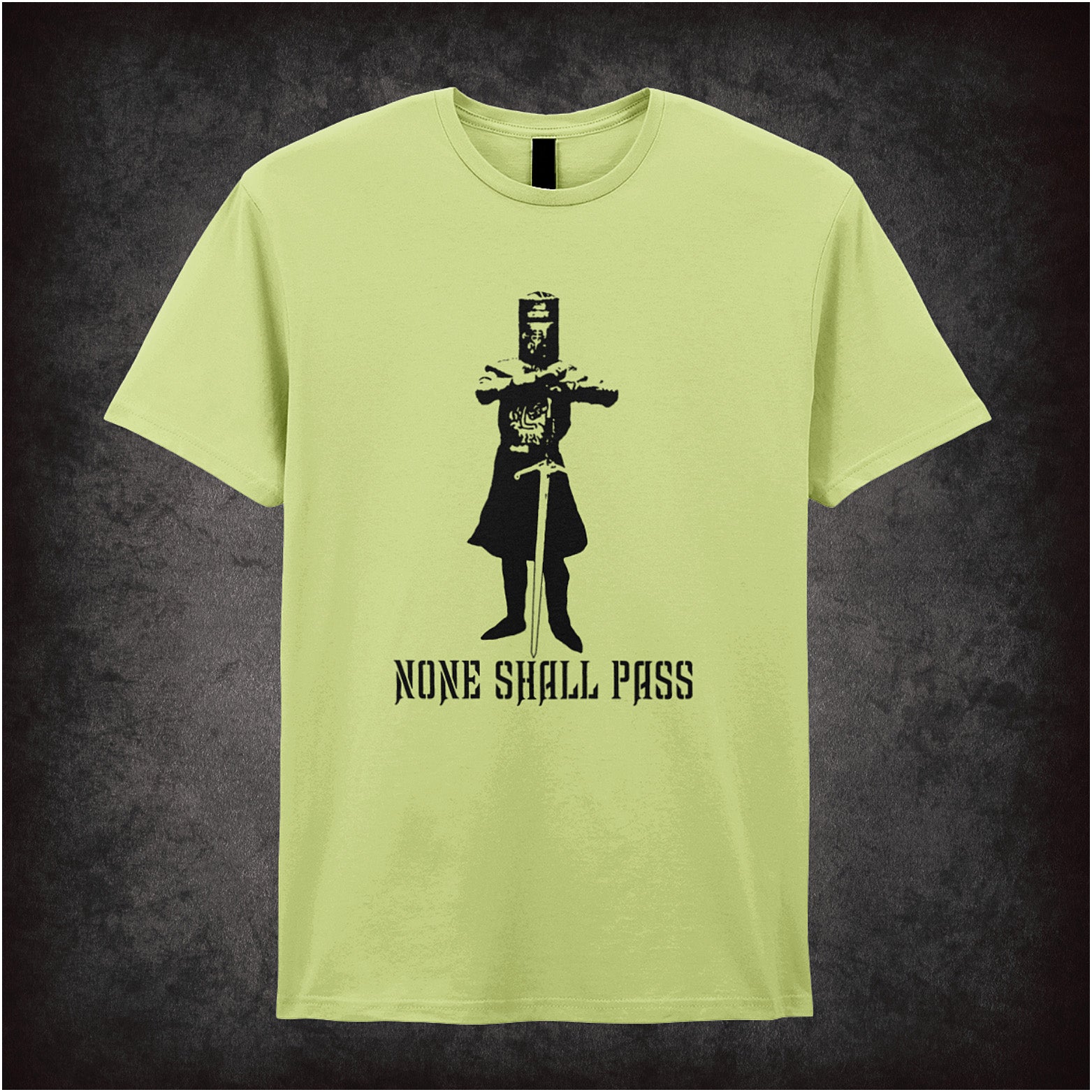 None Shall Pass Monty Python and the Holy Grail inspired soft style pistachio unisex T-shirt featuring iconic Black Knight quote design, perfect for classic comedy fans.