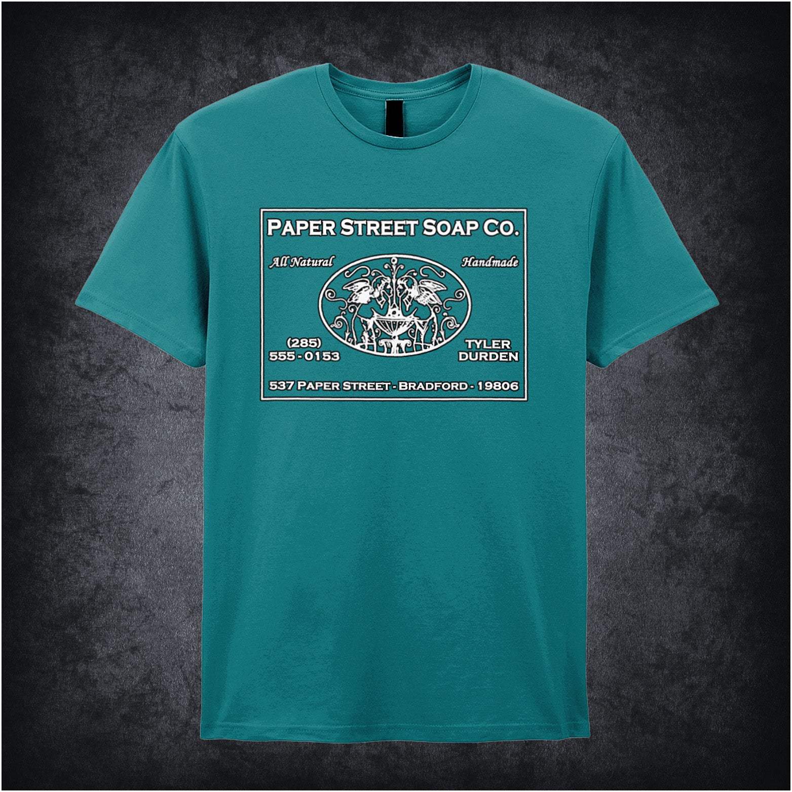 antique sapphire unisex t-shirt featuring the logo of Paper Street Soap Company from Fight Club, with stylized text and vintage design elements.