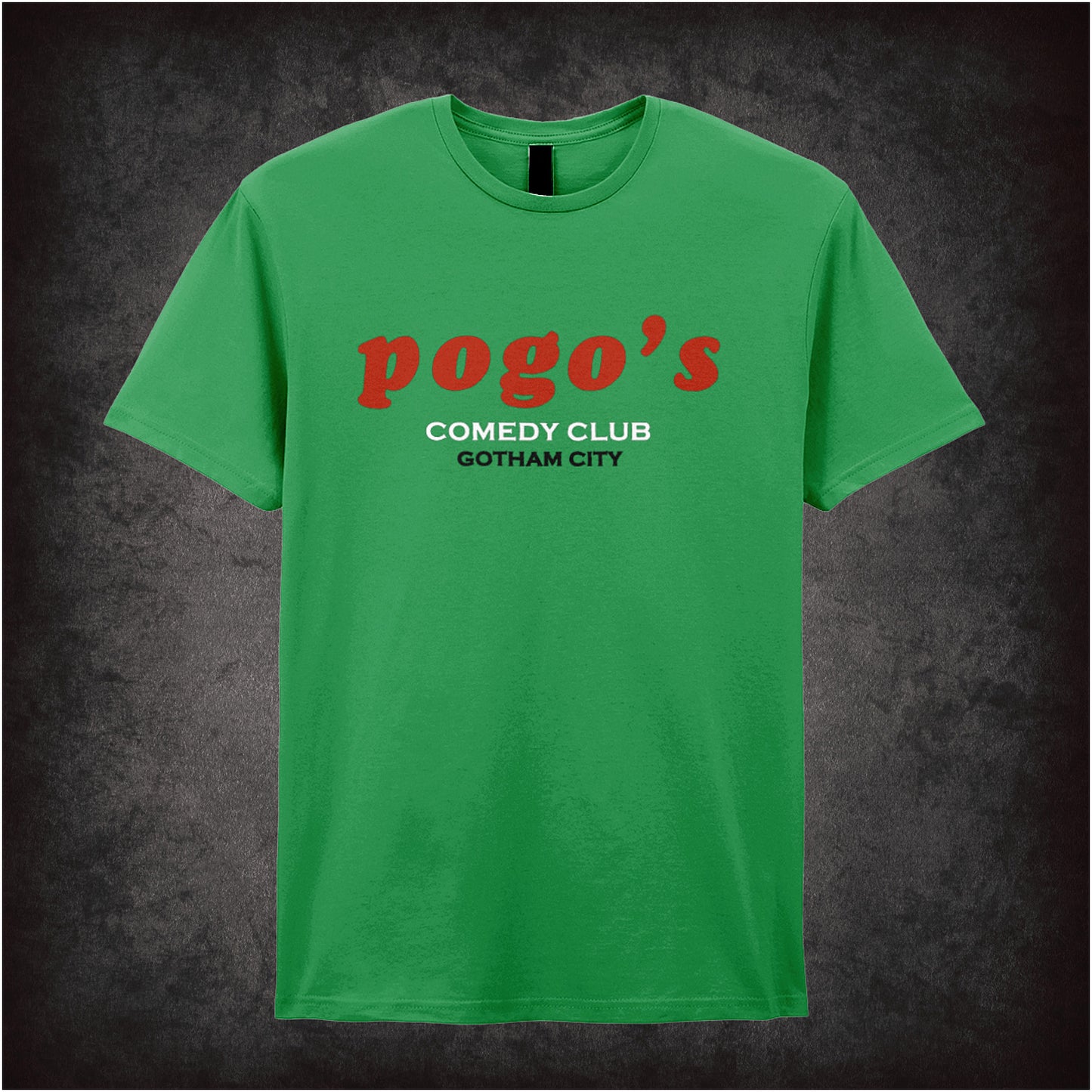 Irish green unisex t-shirt featuring the text “Pogo's Comedy Club, Gotham City” inspired by the Joker, styled with a darkly comic design.