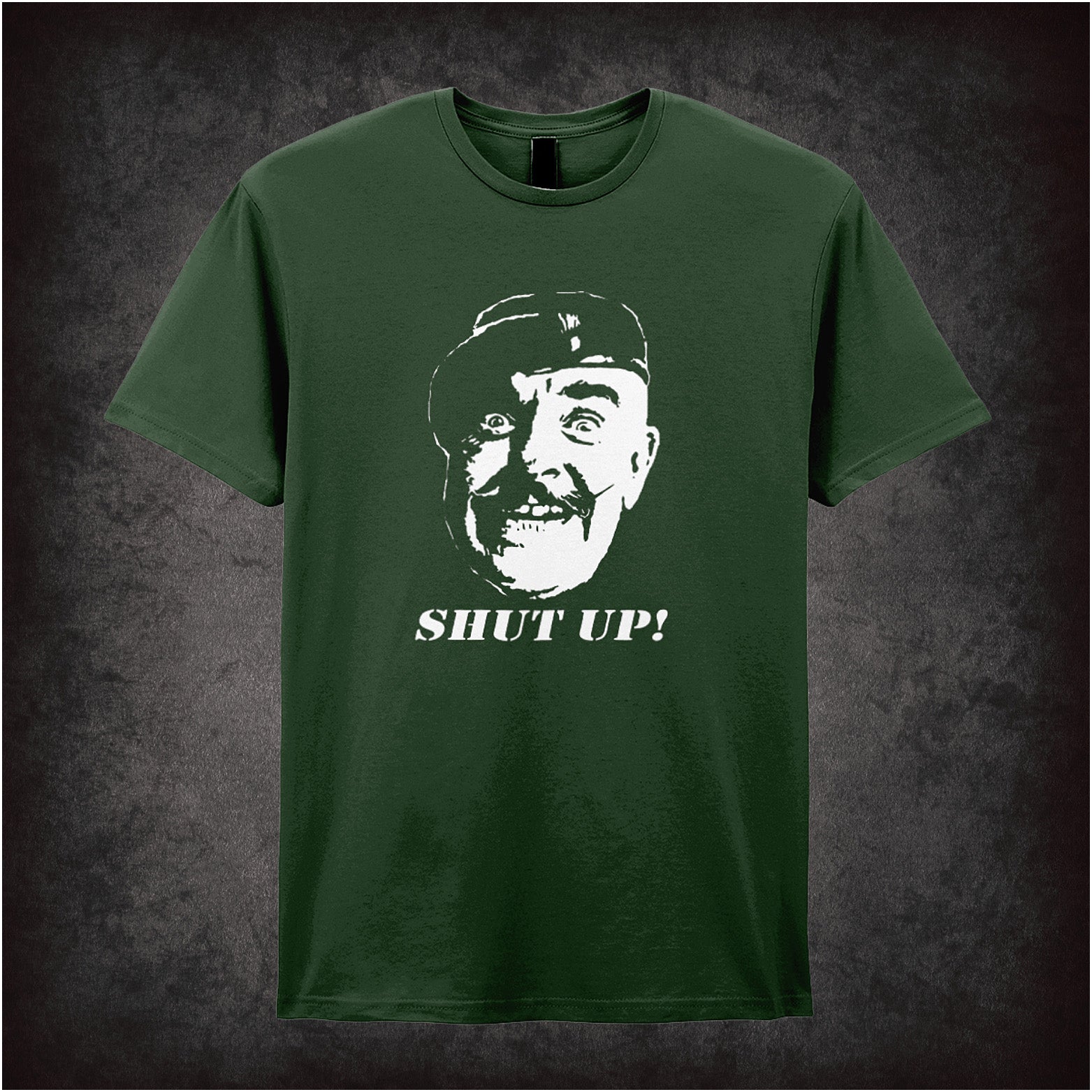 Soft style forest unisex T-shirt featuring the bold phrase "Shut Up!" inspired by It Ain’t Half Hot Mum, designed with a retro British sitcom flair.