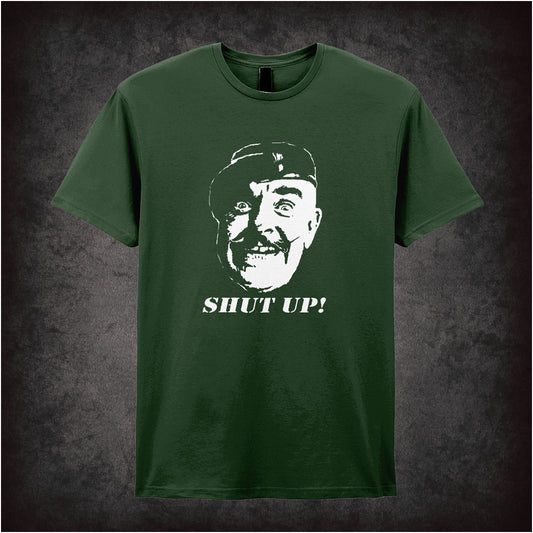 Soft style forest unisex T-shirt featuring the bold phrase "Shut Up!" inspired by It Ain’t Half Hot Mum, designed with a retro British sitcom flair.