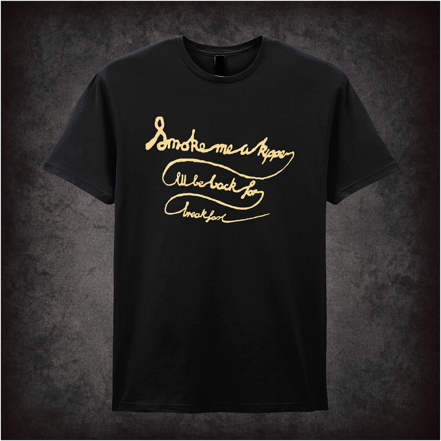 Black soft style unisex T-shirt featuring the quote "Smoke Me a Kipper, I'll Be Back for Breakfast" inspired by Red Dwarf, in bold, playful lettering.