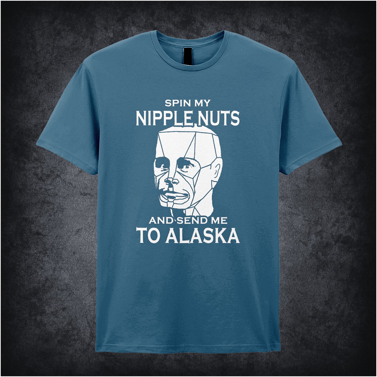 Indigo unisex t-shirt displaying the phrase "Spin My Nipple Nuts And Send Me To Alaska" from Red Dwarf in bold, playful typography.