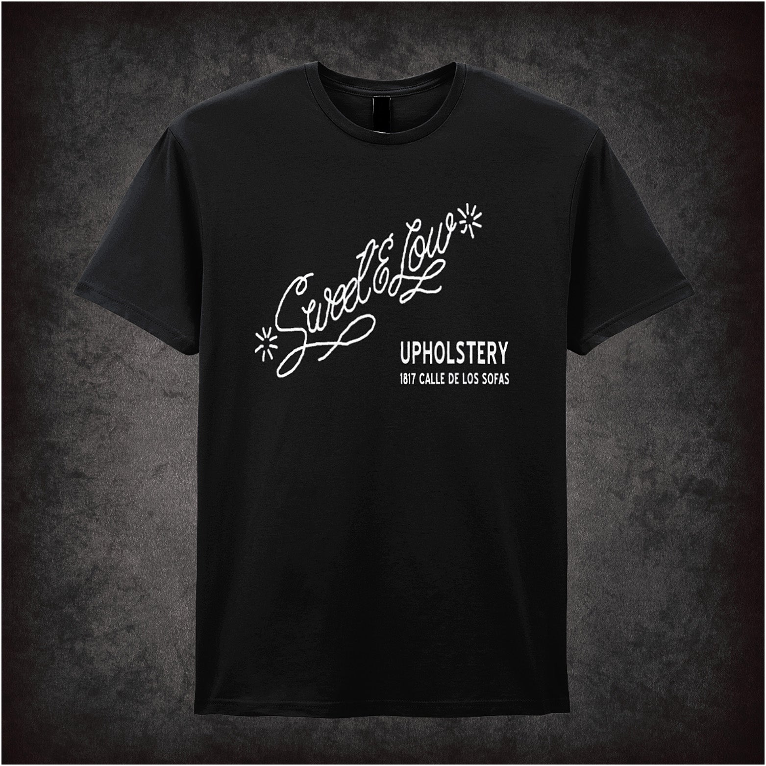 Shop Sweet & Low Upholstery Cheech and Chong inspired black T-shirt with classic comedy design. Soft, unisex, and perfect for fans of vintage humour!