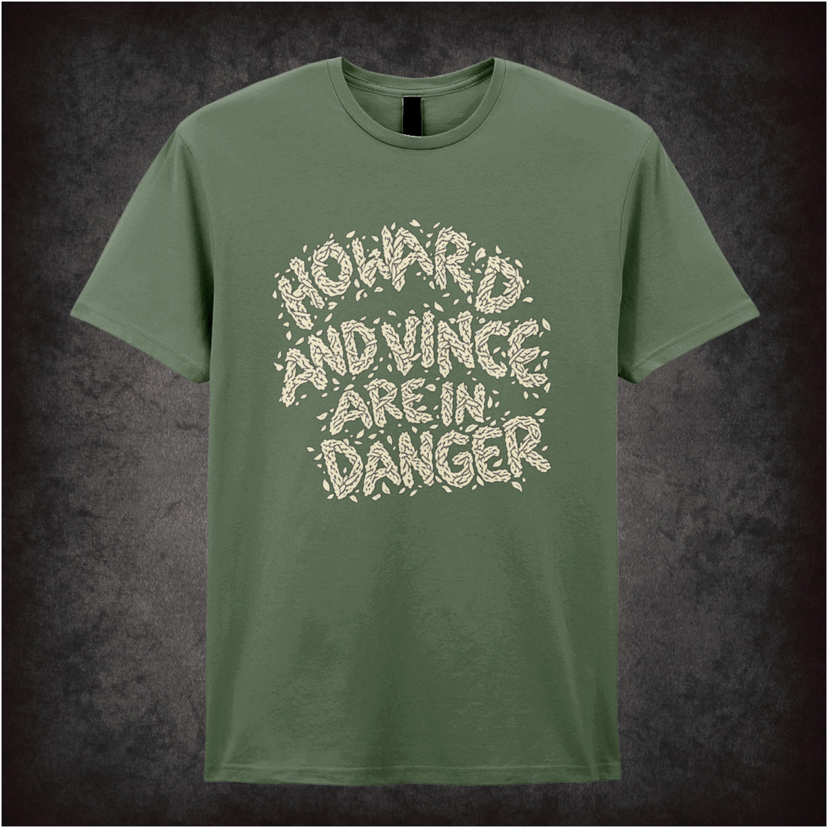 “‘Howard and Vince are in danger’ T-shirt in military green from The Mighty Boosh”