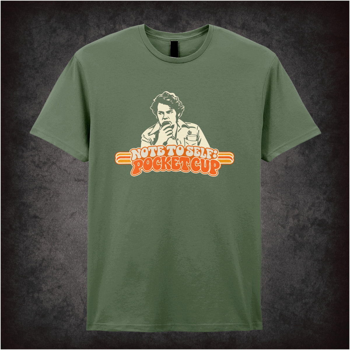 “Bob Fossil ‘Note to self: pocket cup’ T-shirt in military green from The Mighty Boosh”