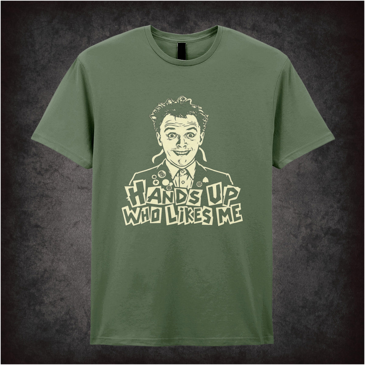 Rick “Hands Up Who Likes Me” T-shirt in military green from The Young Ones