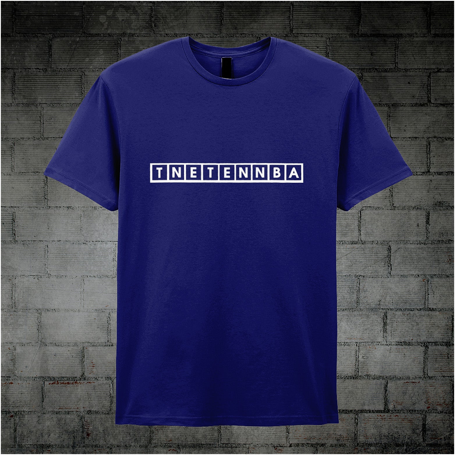 navy unisex T-shirt featuring the text “TNETENNBA” inspired by The IT Crowd, displayed in bold white lettering with a tech-style font.