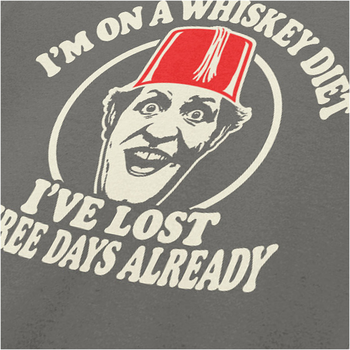 “I’m on a Whiskey Diet, I’ve Lost Three  Days Already” close up T-shirt in charcoal from Tommy Cooper