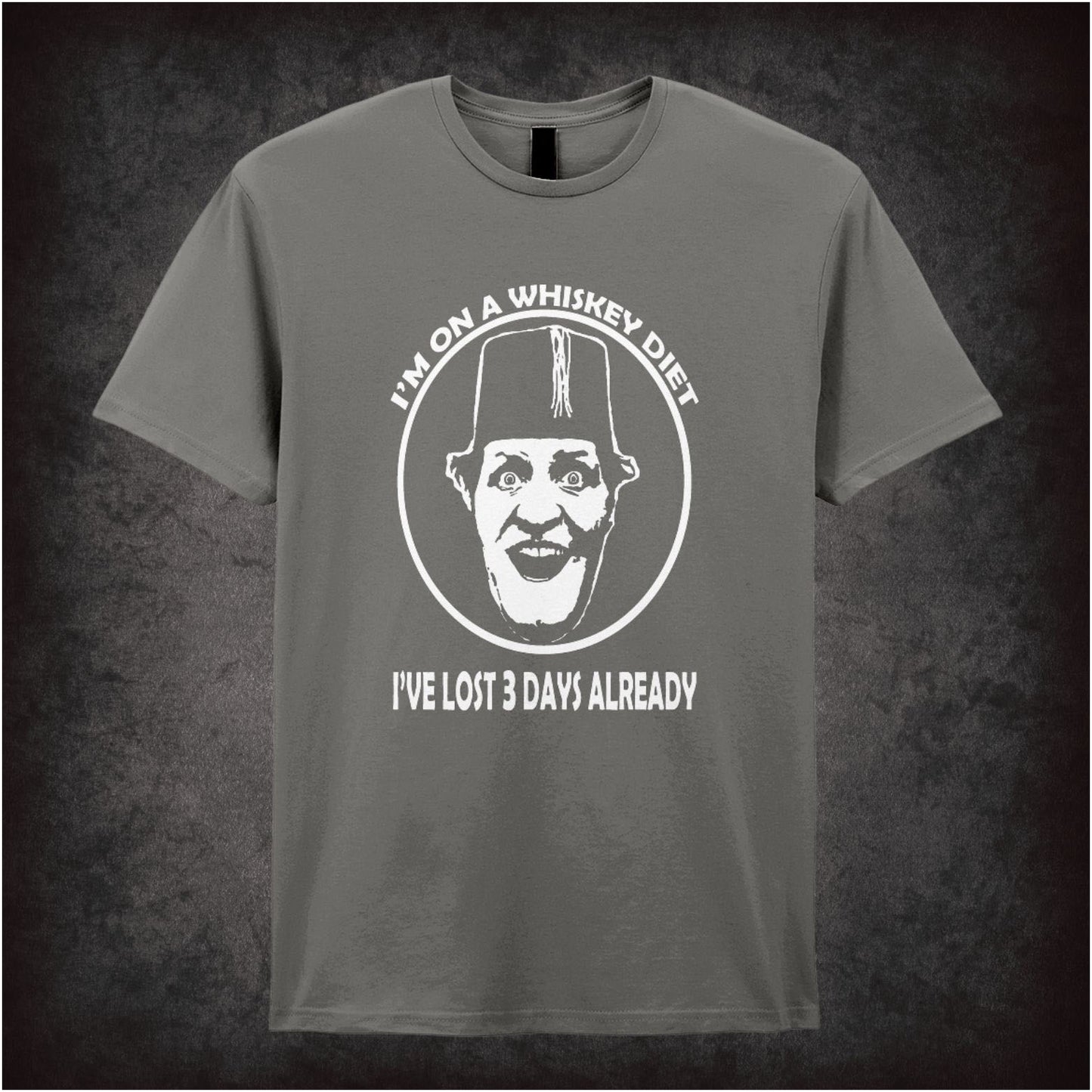 “I’m on a Whiskey Diet, I’ve Lost 3 Days Already” T-shirt from Tommy Cooper