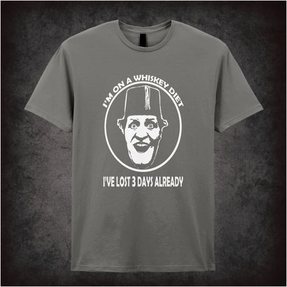 “I’m on a Whiskey Diet, I’ve Lost 3 Days Already” T-shirt from Tommy Cooper