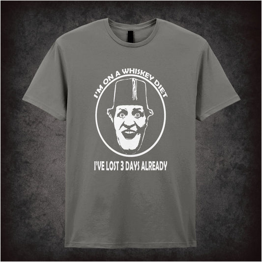 “I’m on a Whiskey Diet, I’ve Lost 3 Days Already” T-shirt from Tommy Cooper
