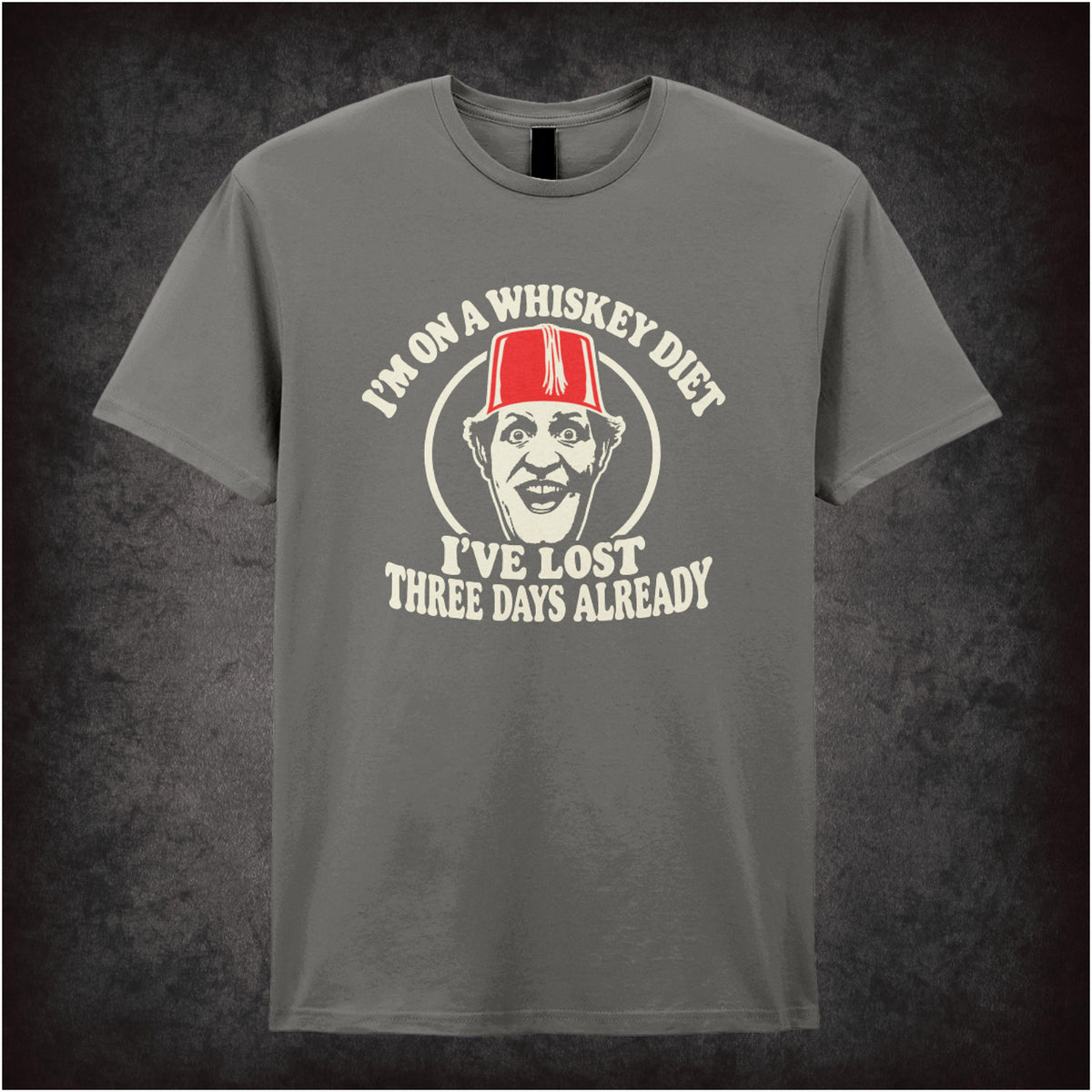 “I’m on a Whiskey Diet, I’ve Lost Three  Days Already” T-shirt in charcoal from Tommy Cooper