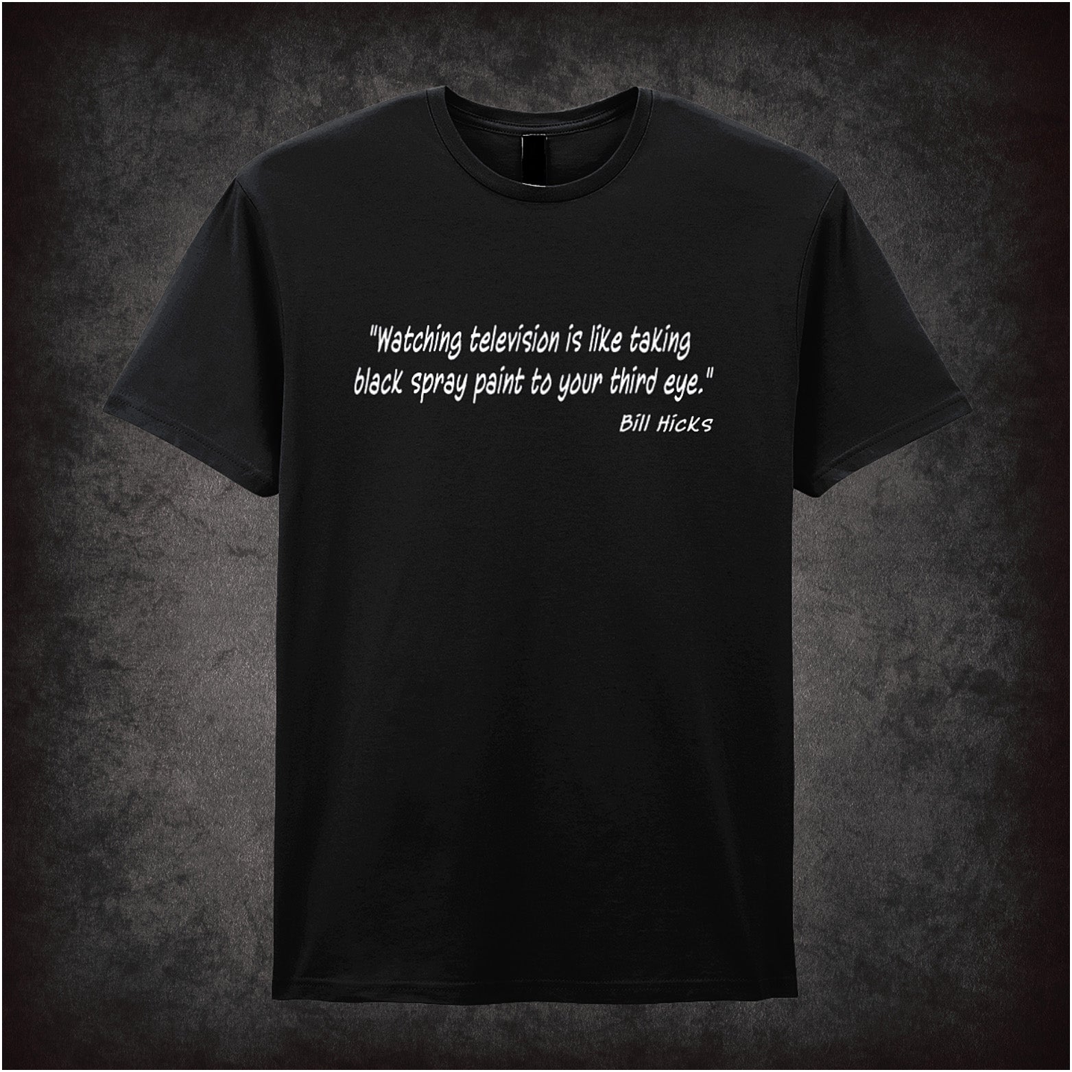 Black unisex t-shirt featuring the Bill Hicks quote "Watching Television Is Like Taking Black Spray Paint To Your Third Eye" in bold, white text.