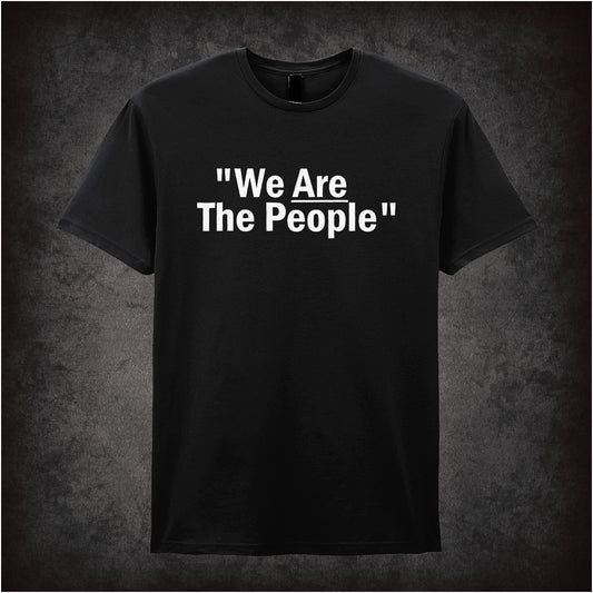 Black unisex t-shirt featuring bold white text reading “We ARE The People” inspired by the movie Taxi Driver, with a gritty urban style.