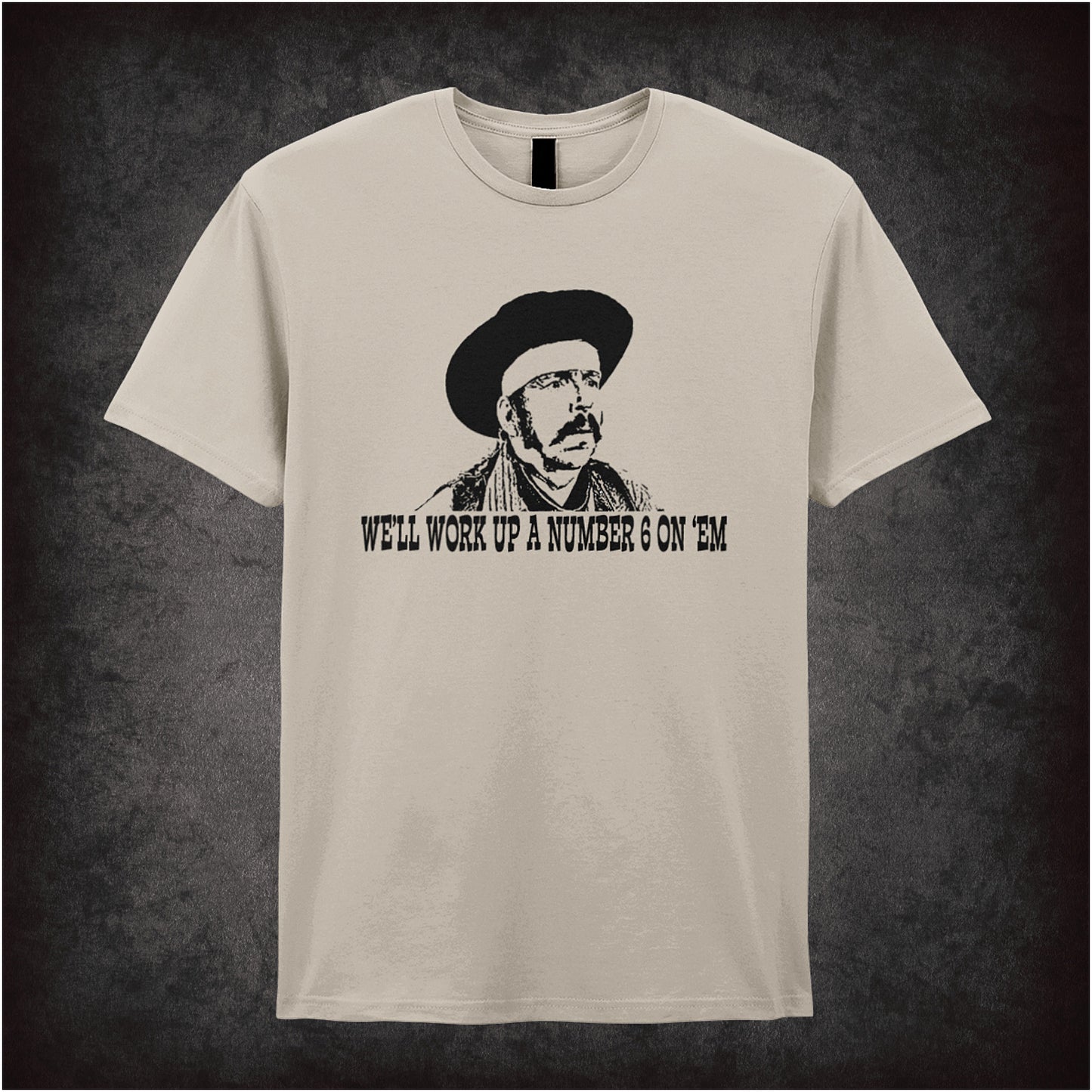 We’ll Work Up a Number Six on ’Em Blazing Saddles inspired soft style sand unisex T-shirt featuring classic movie quote design, perfect for comedy film fans.