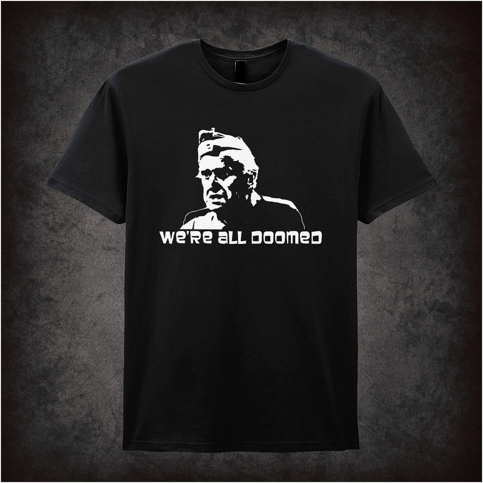 Soft style black unisex T-shirt featuring the phrase "We're All Doomed" inspired by Dad's Army, printed in bold, classic British comedy lettering.