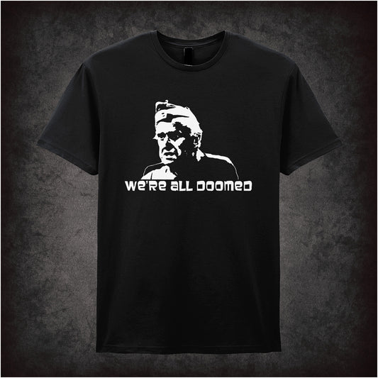 Soft style black unisex T-shirt featuring the phrase "We're All Doomed" inspired by Dad's Army, printed in bold, classic British comedy lettering.