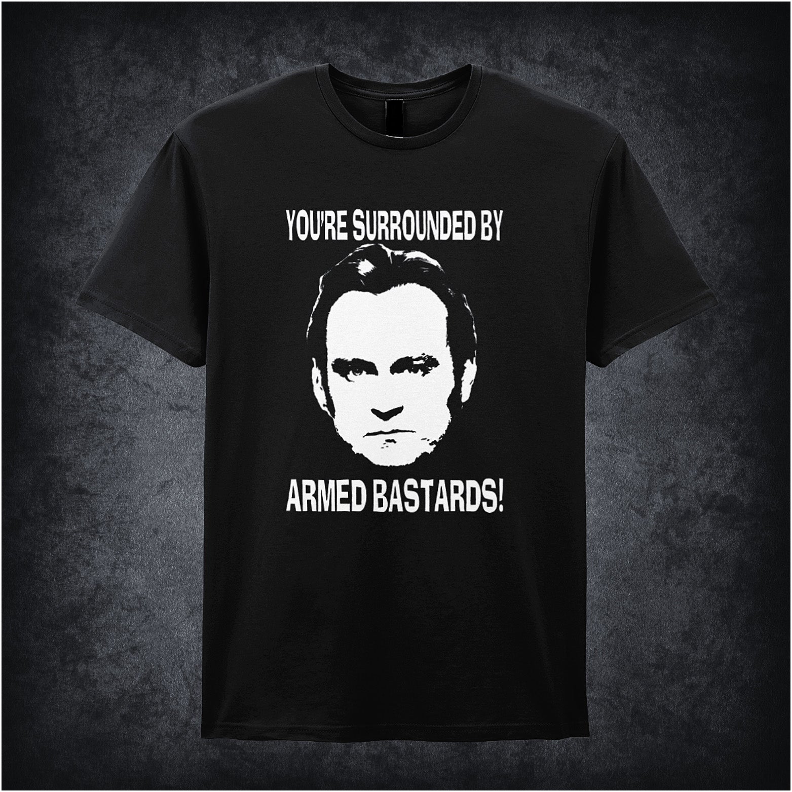 Black soft style unisex T-shirt featuring the quote "You're Surrounded by Armed Bastards!" inspired by Life on Mars, in bold, retro lettering.