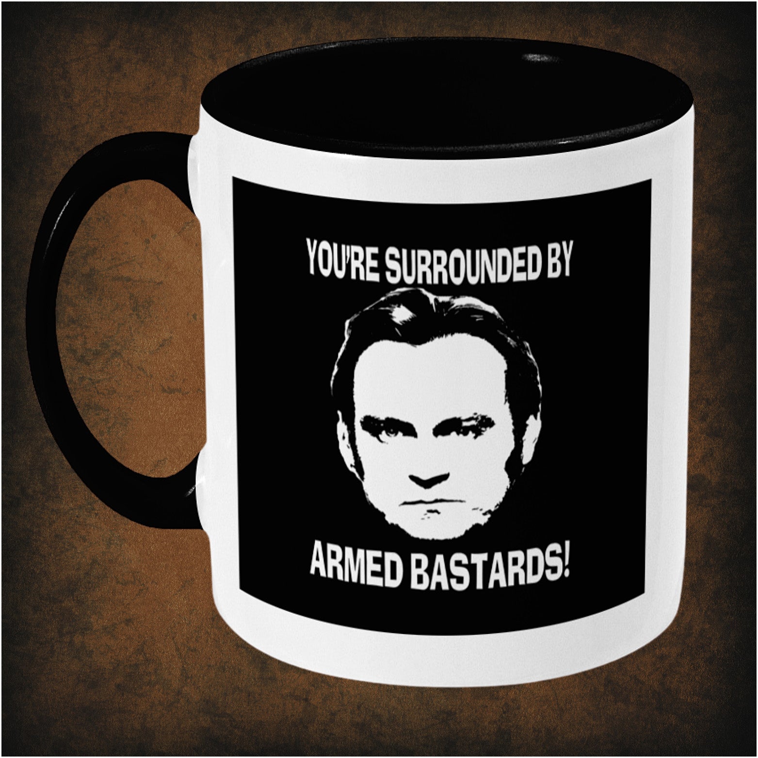 YOU'RE SURROUNDED BY ARMED BASTARDS! – Life on Mars inspired two-toned ceramic mug left hand side featuring bold quote design, perfect gift for fans of British TV crime dramas and Life on Mars enthusiasts.